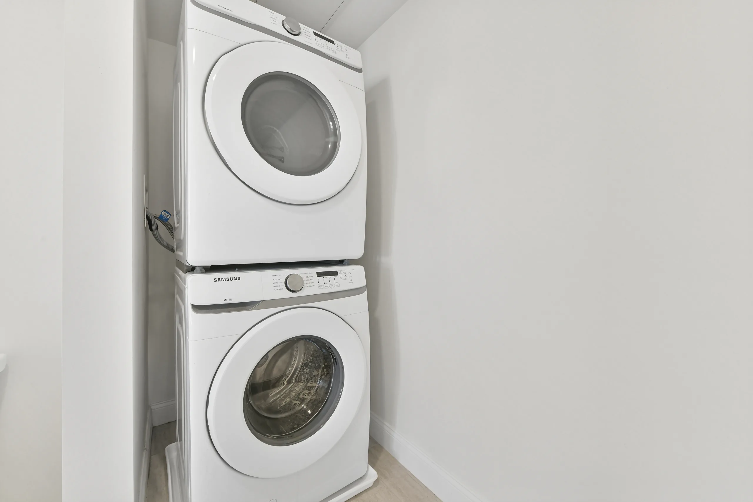 Stacked washer and dryer in-unit at 55 Monk St