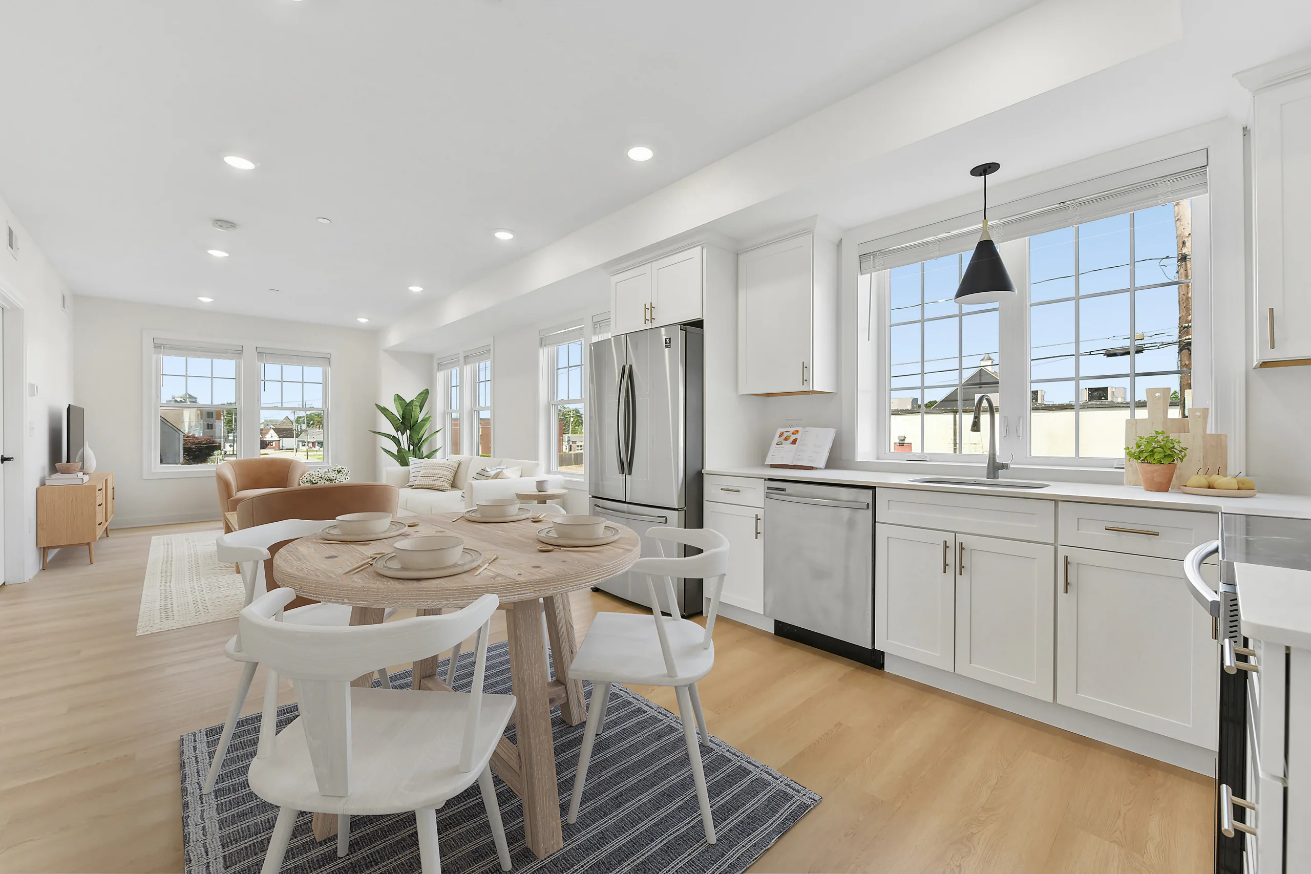 Virtually staged dining area and kitchen at 55 Monk St, Stoughton