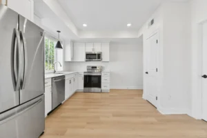 Kitchen with pendant lighting and quartz worktops at 55 Monk St