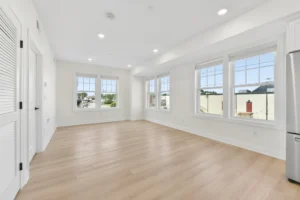 Living space with multiple windows at 55 Monk St